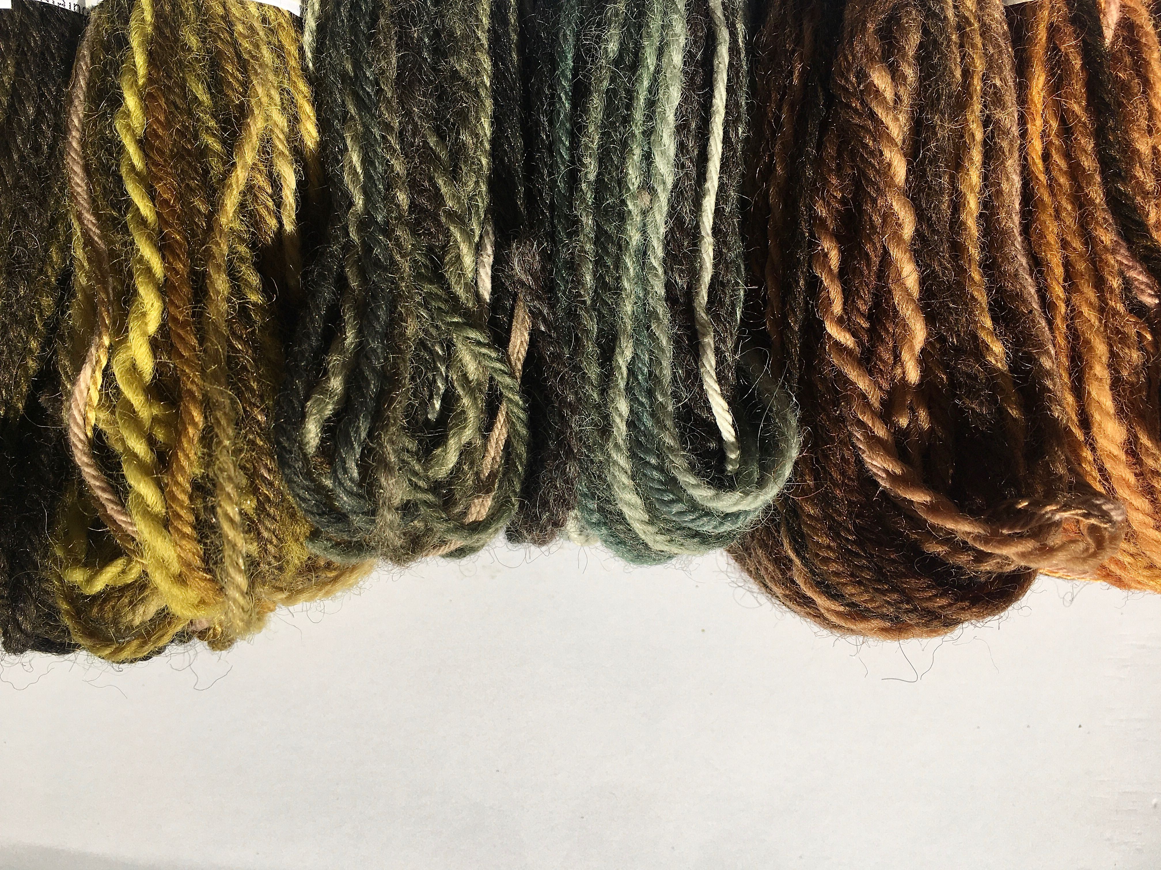 Samples of yarn dyed with natural dyes
